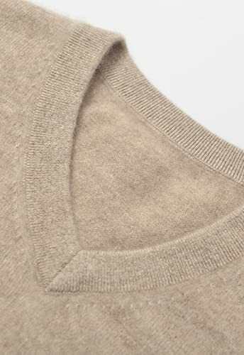 Close-up of a beige V-neck sweater fabric.