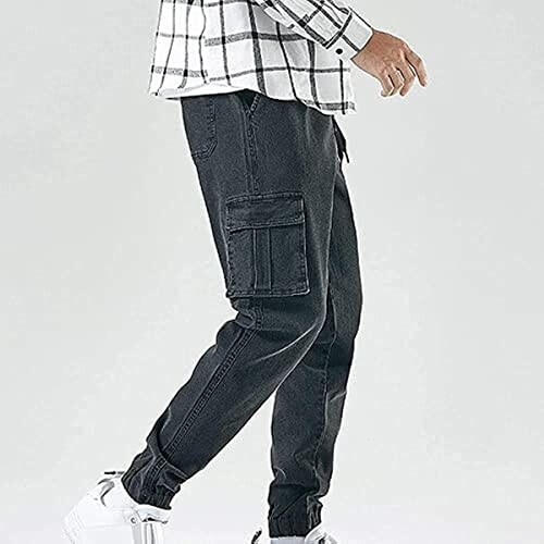 Person wearing black cargo pants and white sneakers