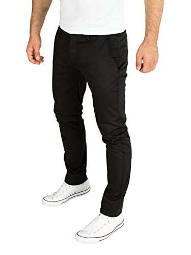 Person wearing black chinos and white sneakers