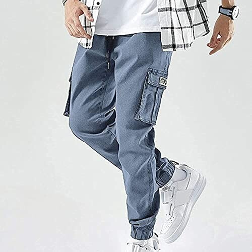 Person wearing blue cargo pants and white sneakers