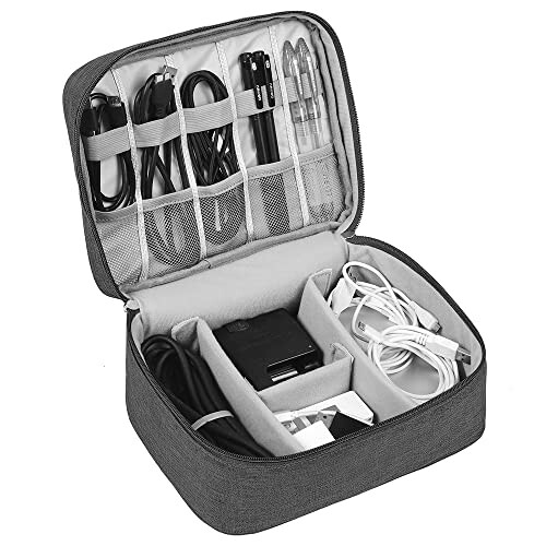 Open electronics organizer case with cables and gadgets.