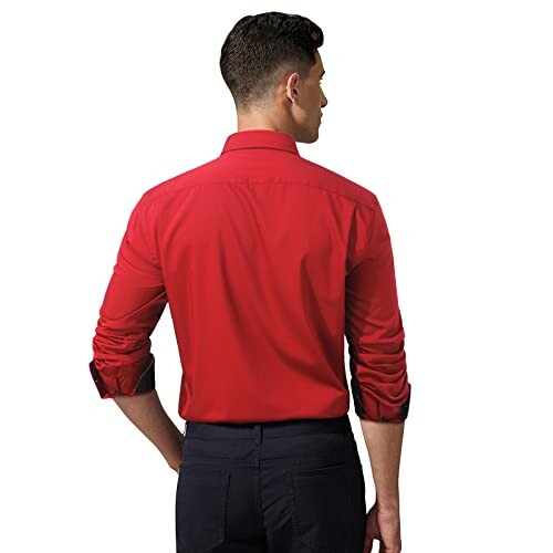 Man in red shirt, back view.