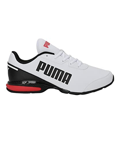 Back view of black and white Puma sneakers with red accents.