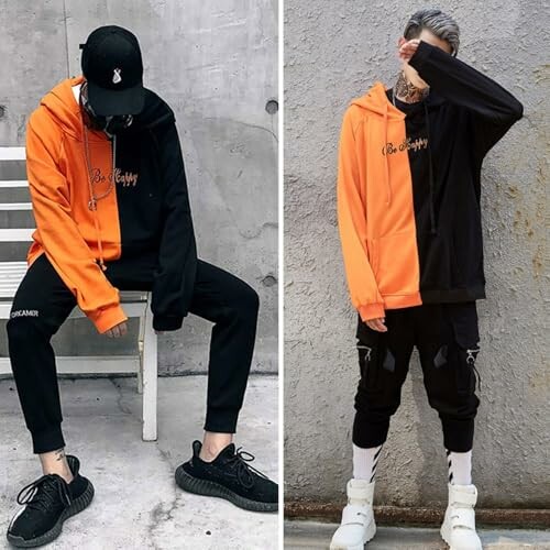 Two models wearing contrasting black and orange hoodies with casual pants and sneakers.